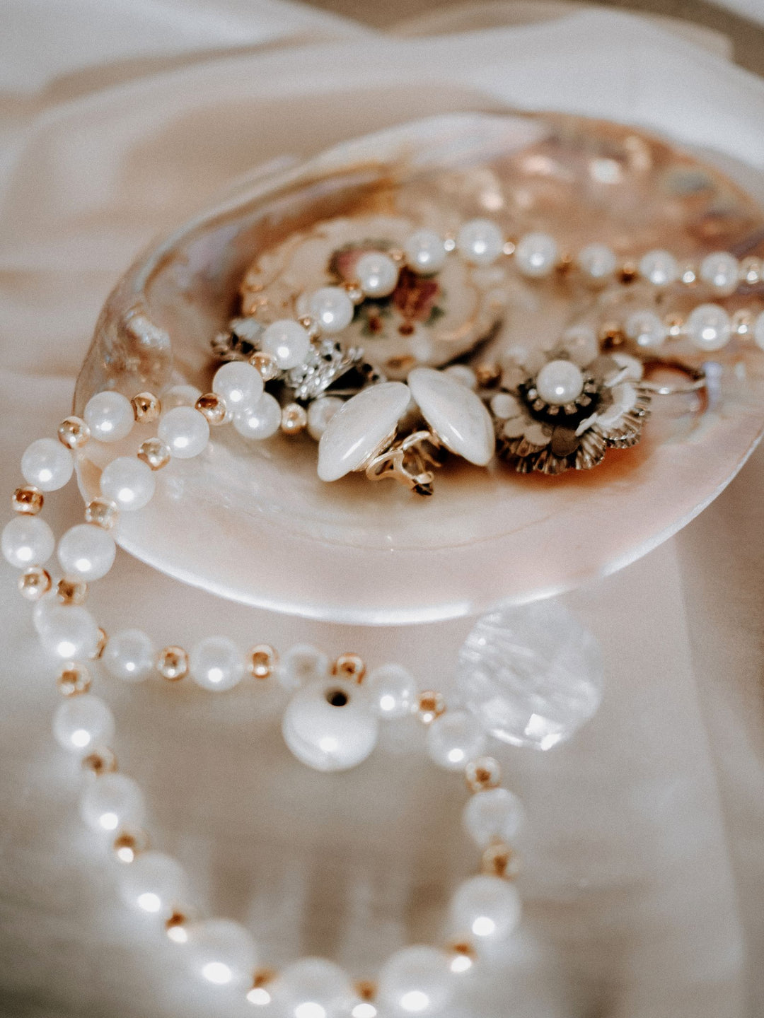 Large lustrous pearls arranged with elegant vintage jewelry